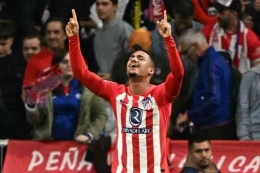 Samuel Lino, merayakan gol kedua Atletico Madrid saat menghadapi Borussia Dortmund, Kamis 11/4/2024. Sumber : (AFP/JAVIER SORIANO) via kompas.com