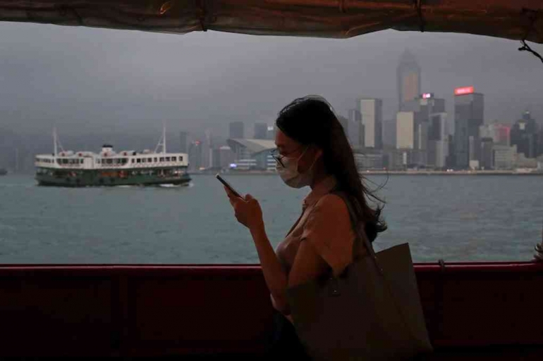 Masyarakat Hong Kong kini sudah mulai terbiasa dengan penerapan pasal 23 dengan melakukan self censorship. Photo: AP: Kin Cheung 