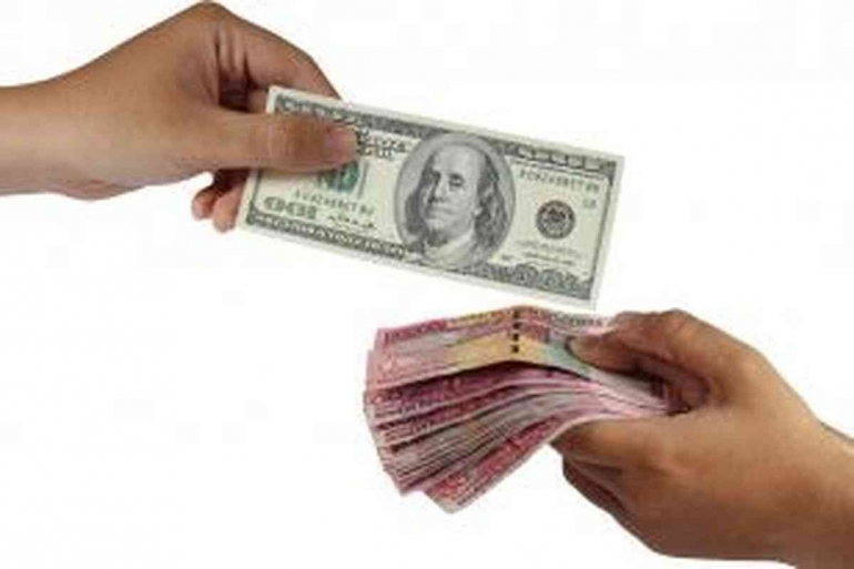 lustrasi nilai tukar rupiah melemah terhadap dollar AS.(shutterstock via Kompas.com)