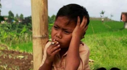 Ilustrasi gambar anak kecanduan merokok  | Sumber gambar: Sijori Images / Barcroft India/Mirror via Sumsel.tribunnews.com