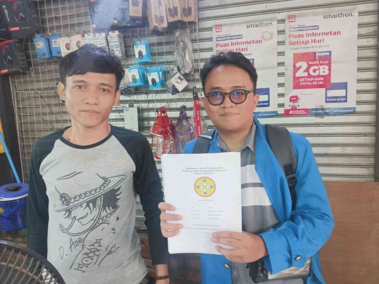 Foto penyerahan laporan