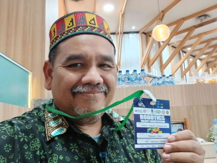 Omjay dan tanda peserta/dokpri