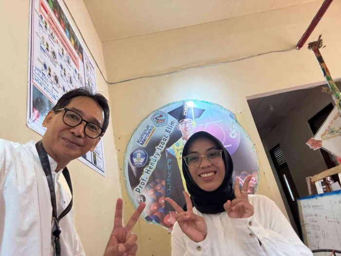(Selfie photo) Prof. Elim and Miss Andwi Wulansari, M.Eng candidate: welcome to our physics department newly technician.