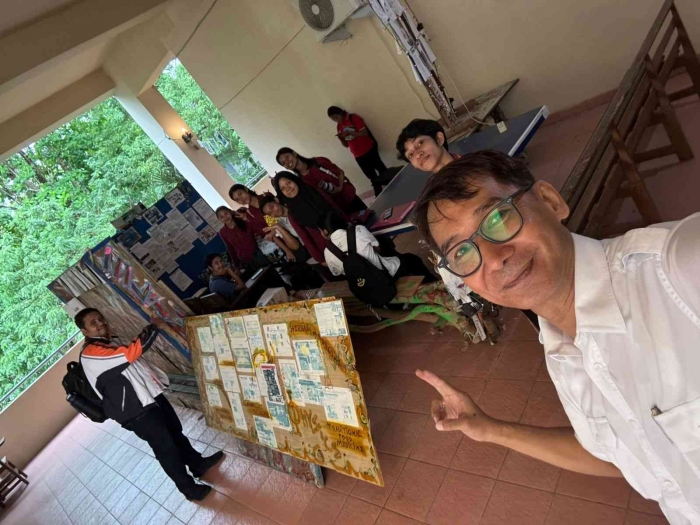 (Prof. Elim selfie photo) Front view of CAP, Pattimura university: a gentle and humble scientific art place.