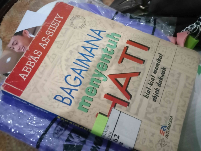 Buku bagaimana menyentuh hati/dokpri
