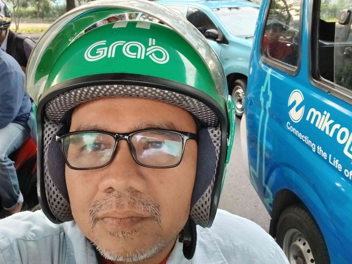 Omjay naik.gojek motor/dokpri