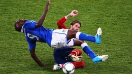 Sergio Ramos of Spain and Mario Balotelli of Italy in action during their UEFA EURO 2012 final